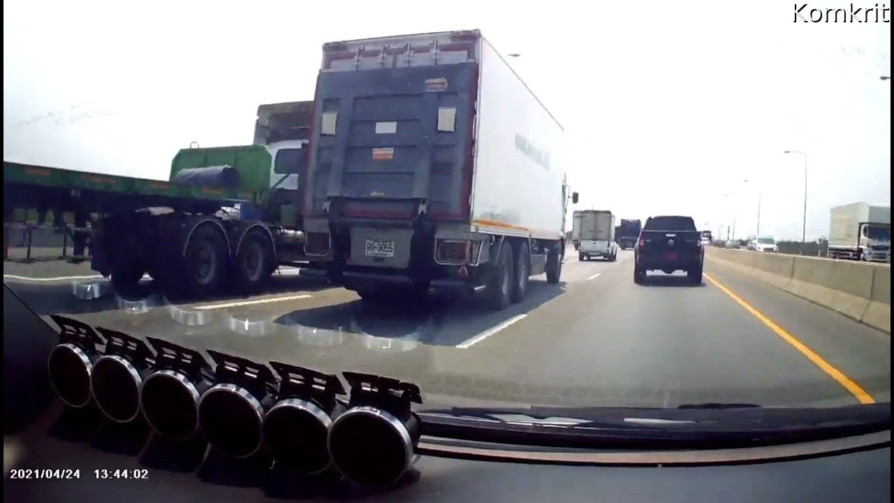 Truck Tire Flings Road Debris through Windshield || ViralHog