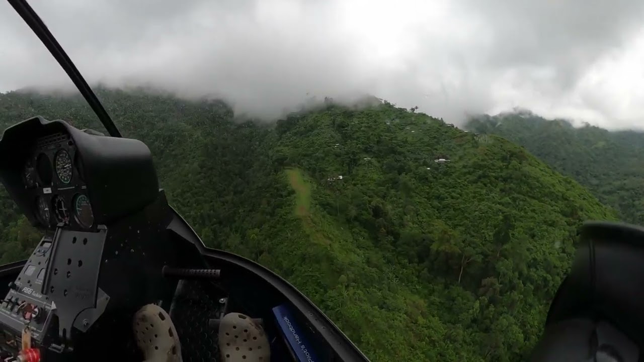 Flying supplies and people to remote mountain village in a R66 helicopter