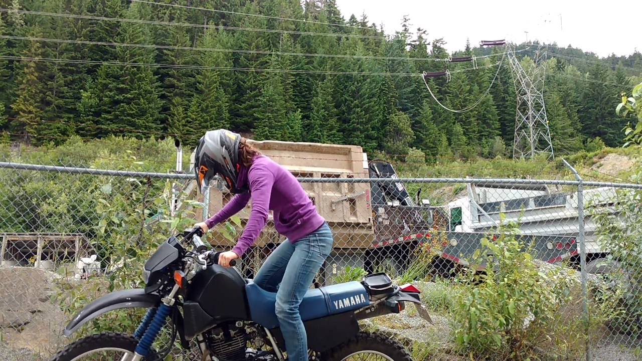 Girl starts bike, does not die.