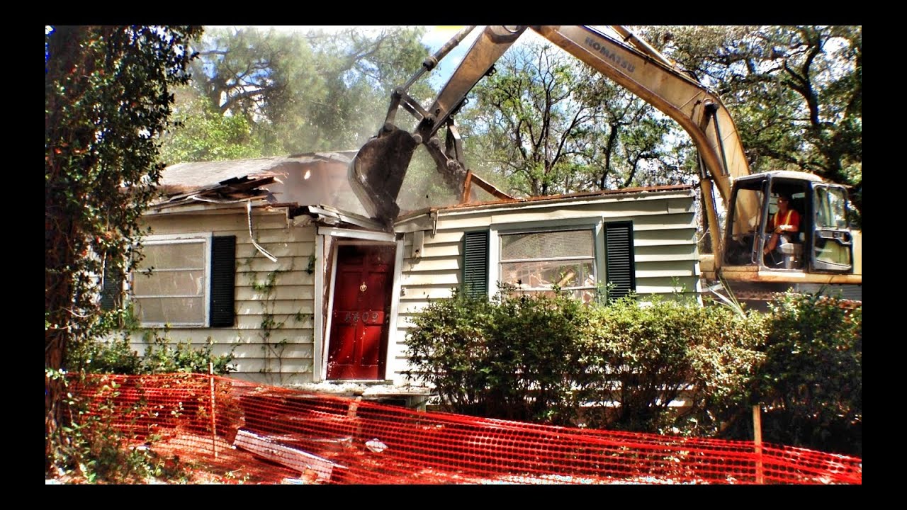 Excavator Vs. House