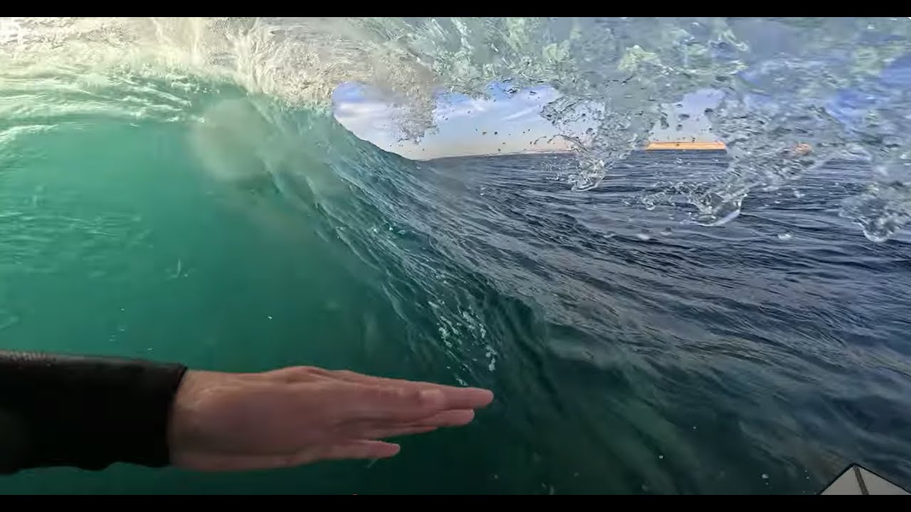 SURFING SUNSET BARRELS
