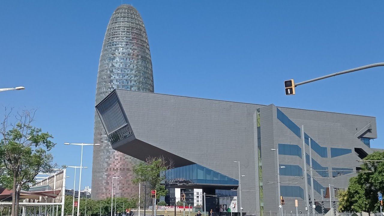 TORRE AGBAR/ A BULLET SHAPED SKYSCRAPER TOWER IN BARCELONA   (HAS 33 FLOORS & 4,400 WINDOWS)