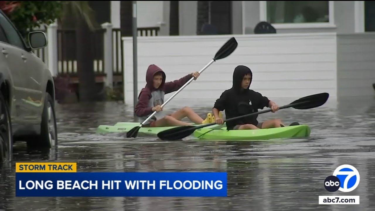 Neighbors kayak in the streets as SoCal is hit with street flooding