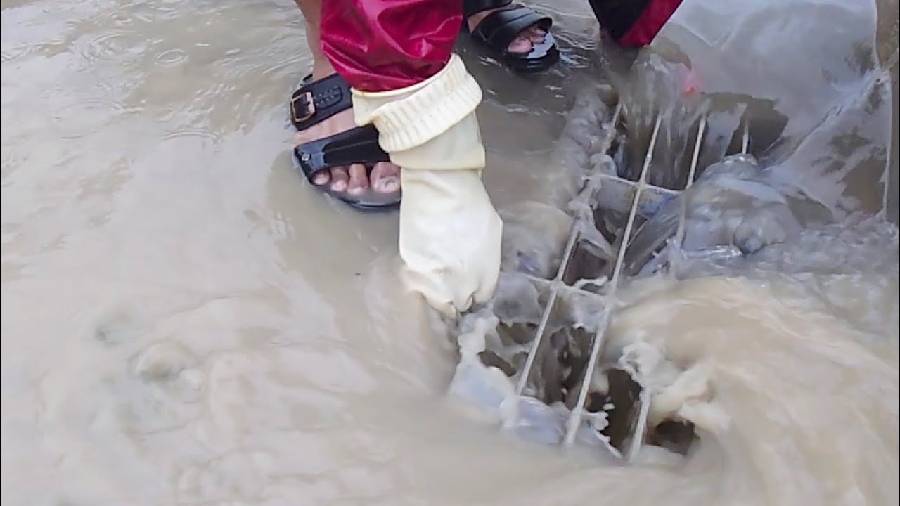 Hard Work Removal Unclog Culvert Drain plastic Debris avoid Rain Flooding