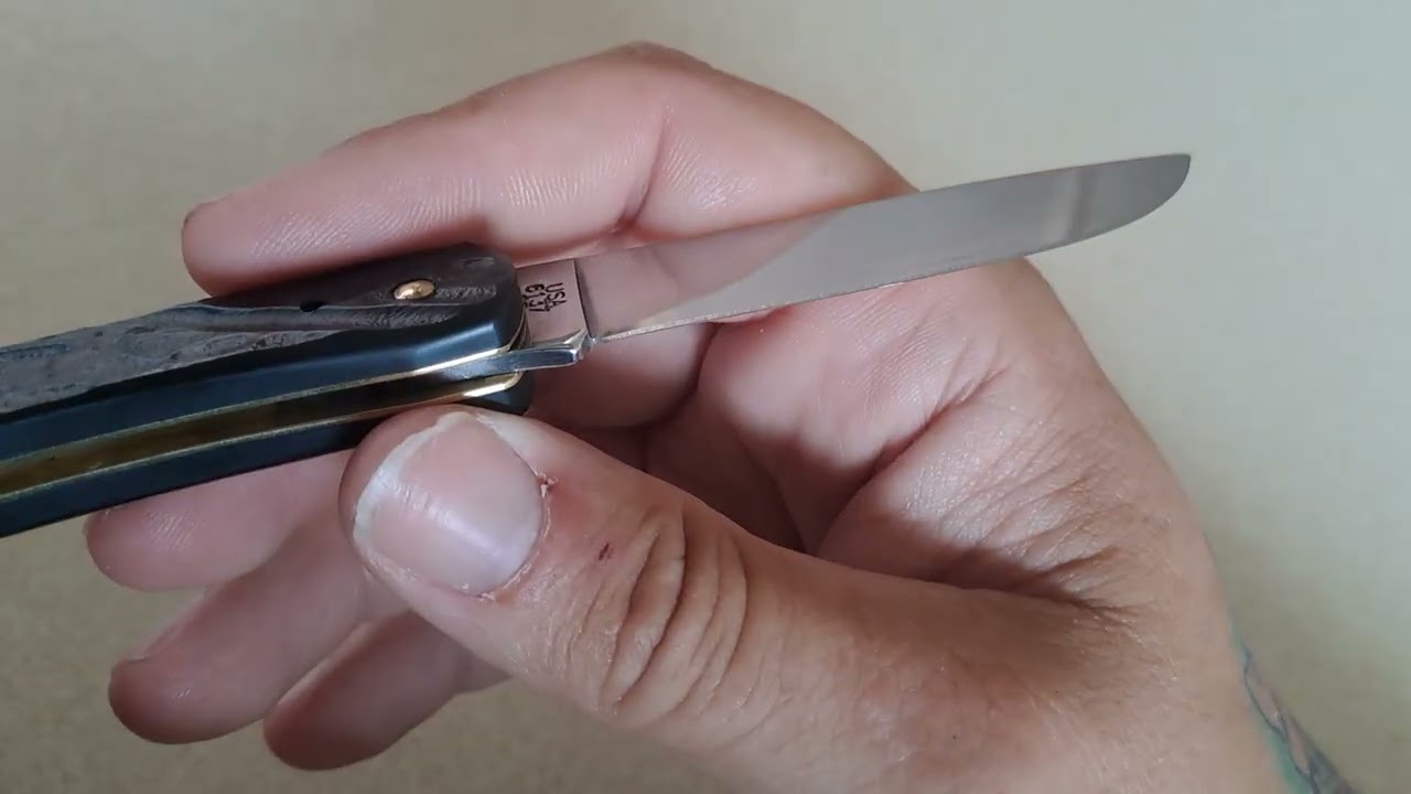 Case rough black (gum fuddy) jigged synthetic stainless steel sodbuster Jr 