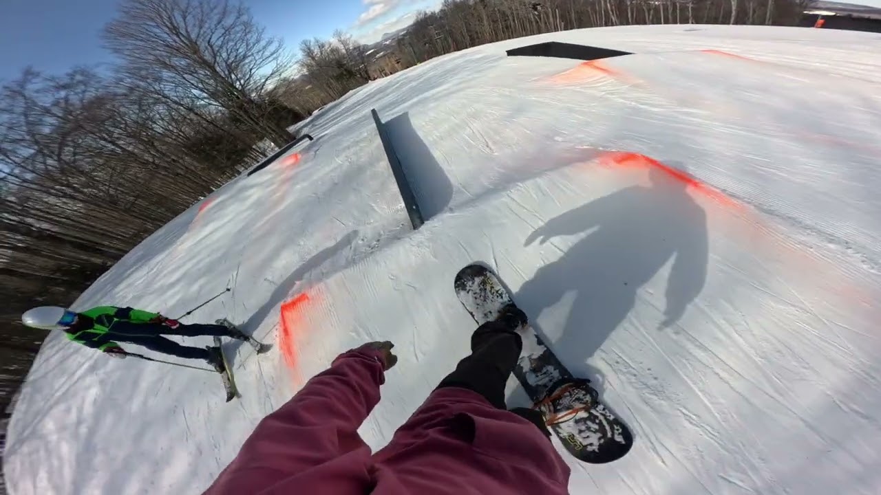 Beginner snowboarder trying rails and boxes for first time - Burke Mountain VT
