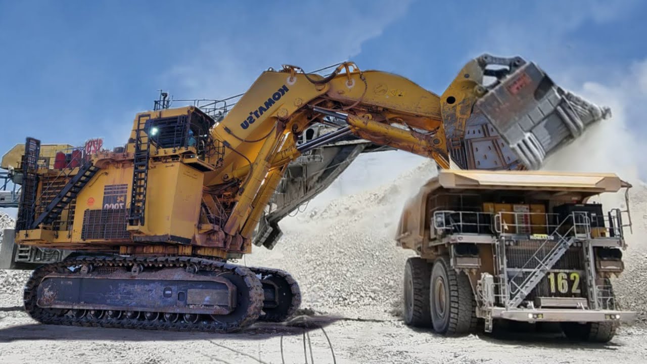 Excavator Komatsu PC 7000 Loading Dump Truck Komatsu 930E - Copper Mining