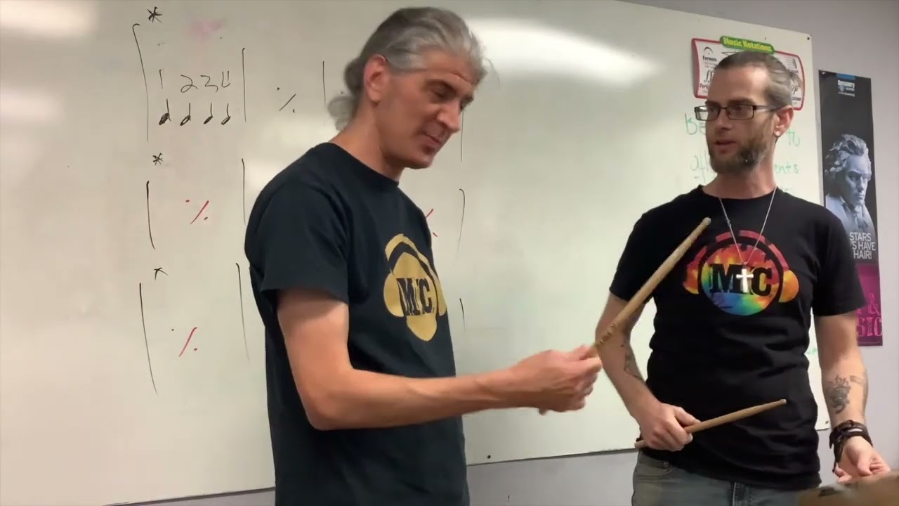 Mr. Aaron teaches blues rhythm