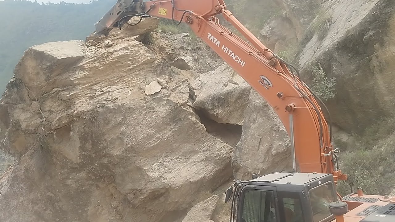 Breaking  Rocky Mountain with  Tata Hitachi Excavator for Mountain Road