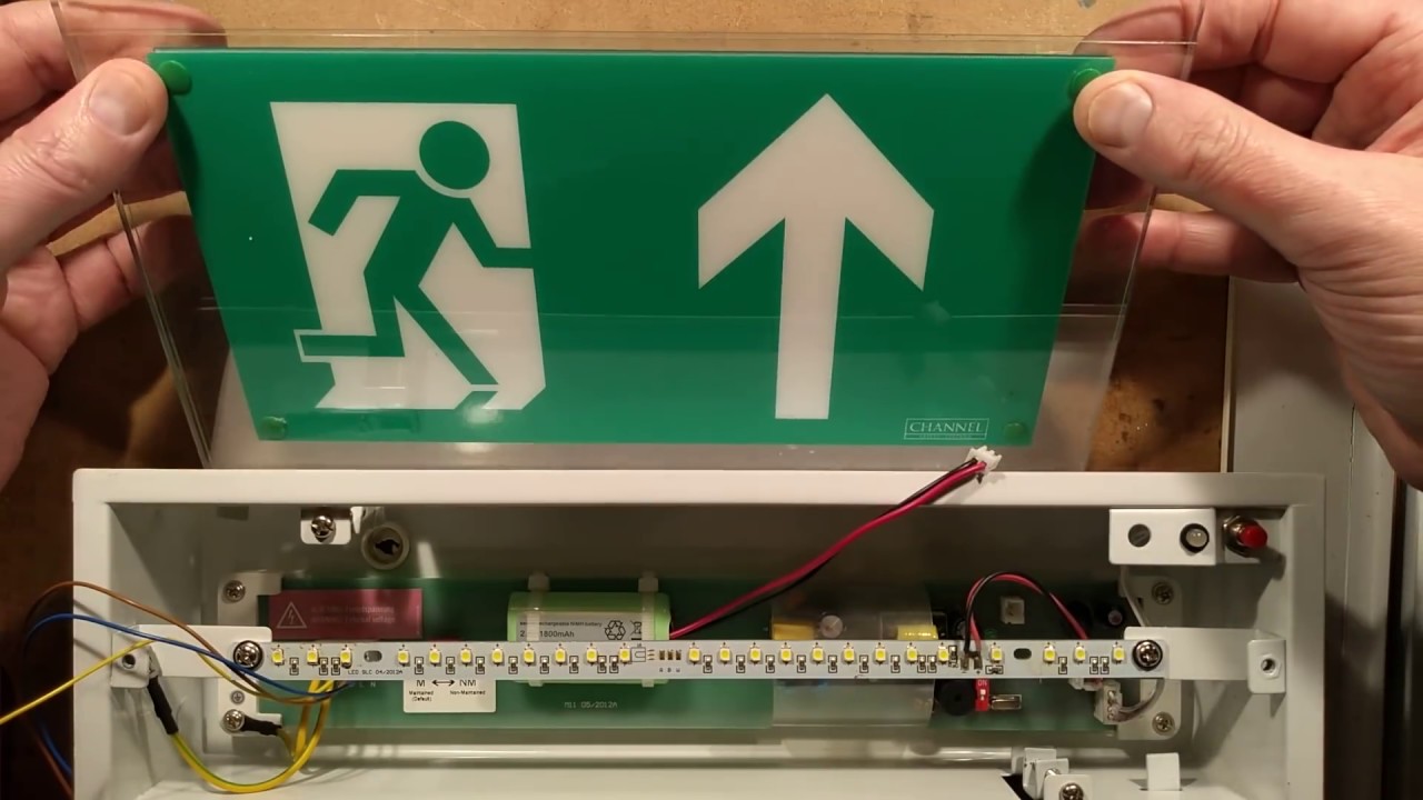 Inside a self-testing emergency exit sign.