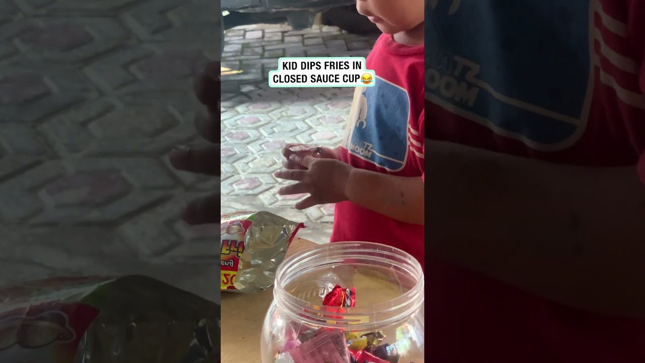 Kid Dips Fries In Closed Sauce Cup 🤣 (🎥: ViralHog/Nisa Agustin)