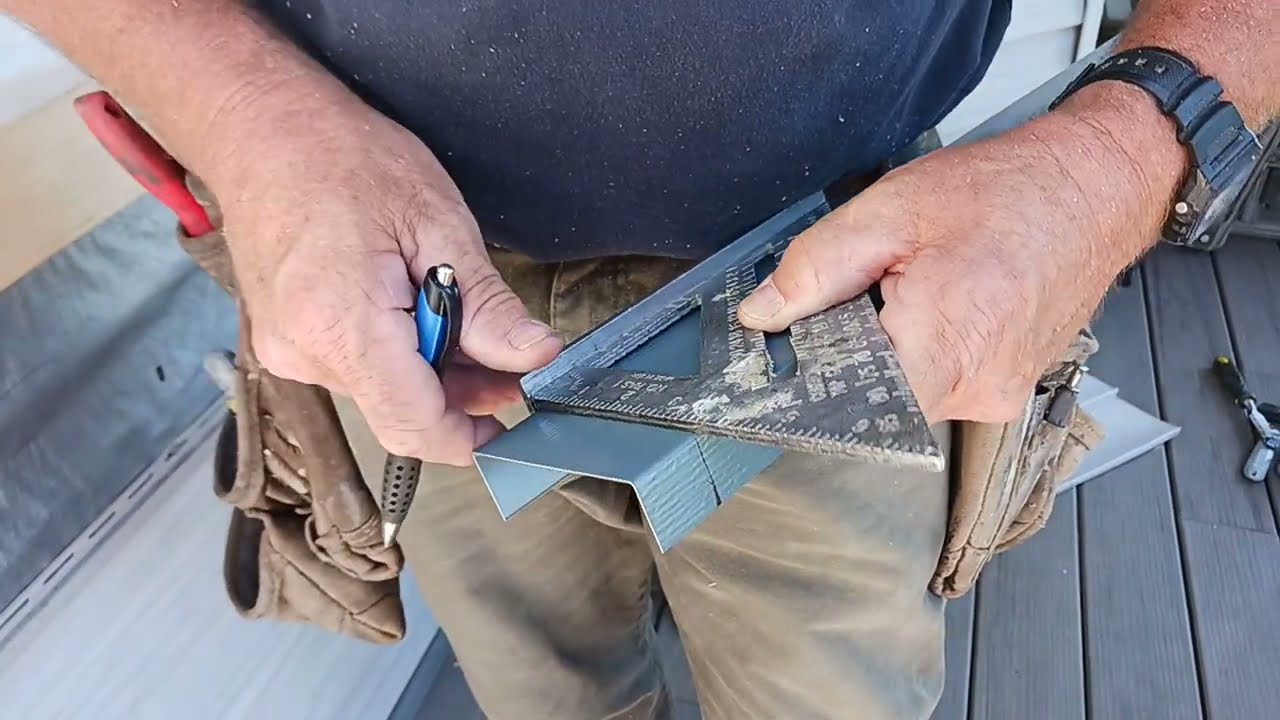 aluminum trim work, capping an exterior flat windowsill on a farmhouse.
