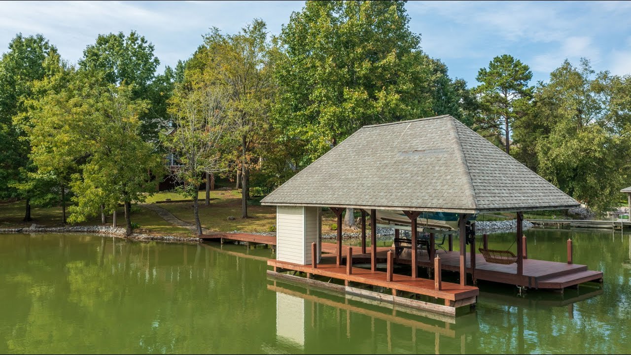 Tellico Village Lakefront Home with Dock in Private Cove ~ 5 bedrooms, 5 baths, 5 car garage.
