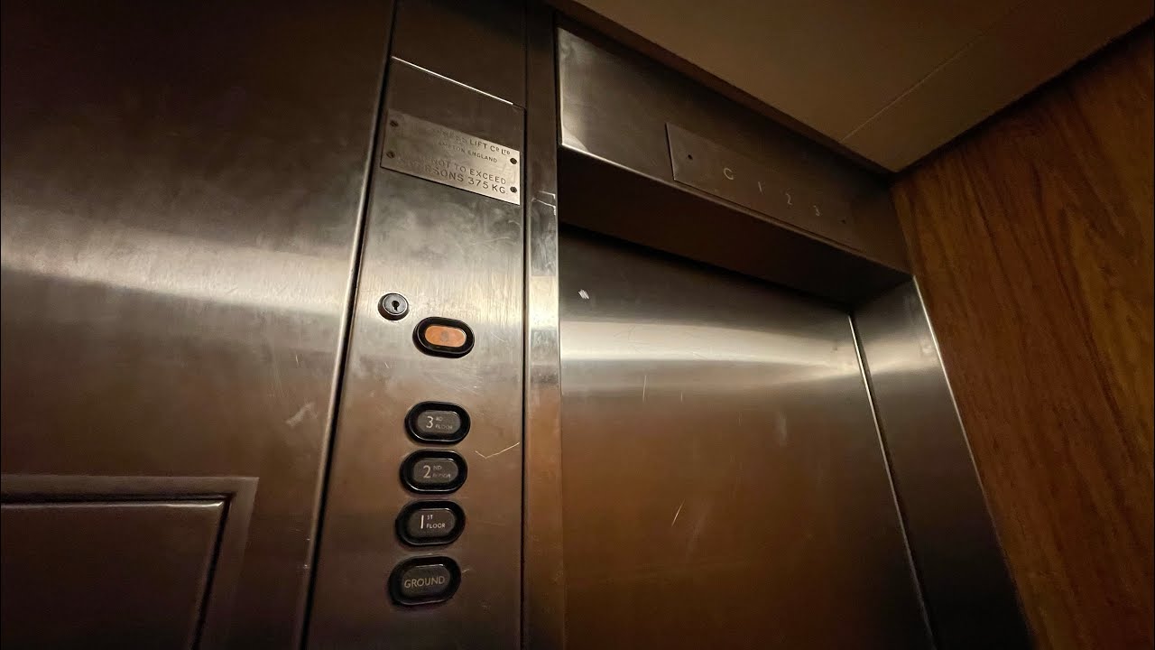 Express Lift traction elevator at building in city centre in Plymouth UK