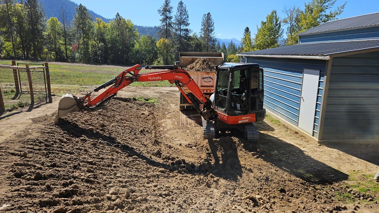 Barn yard dress up with the Kubota KX 040 4 excavator and dump truck