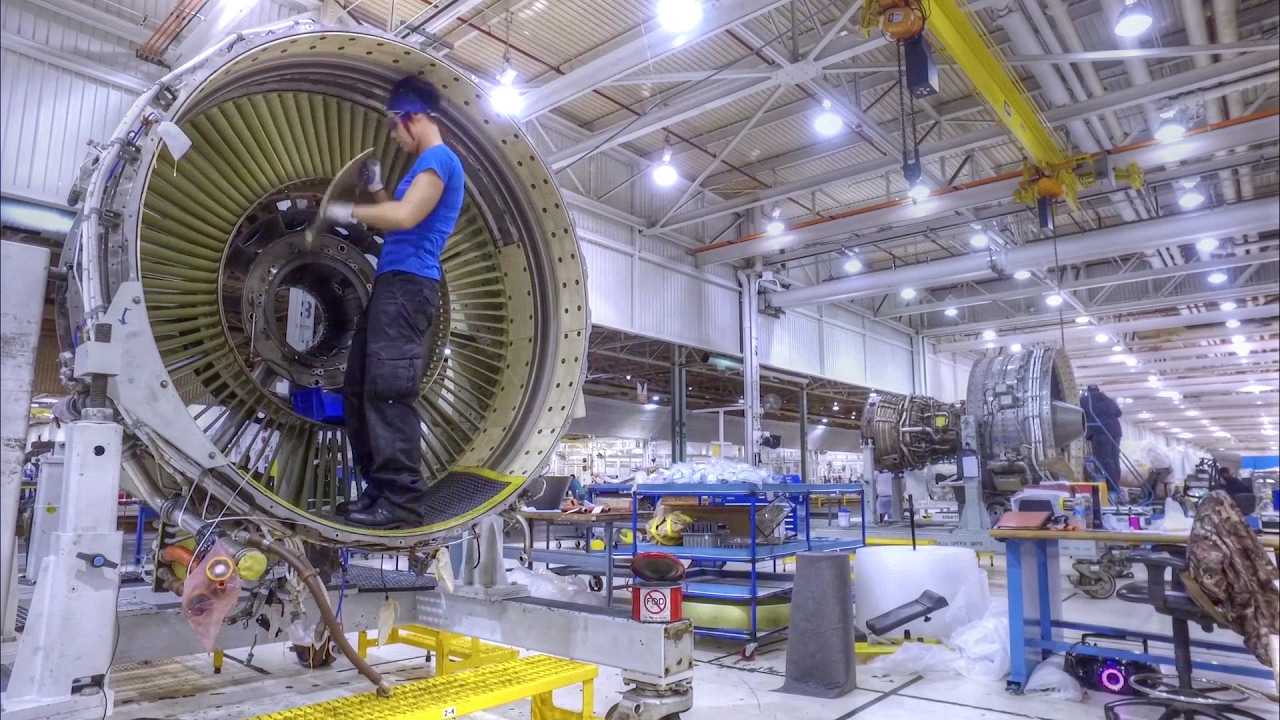 Mechanics Tinkering with Aircraft at Tinker Air Force Base