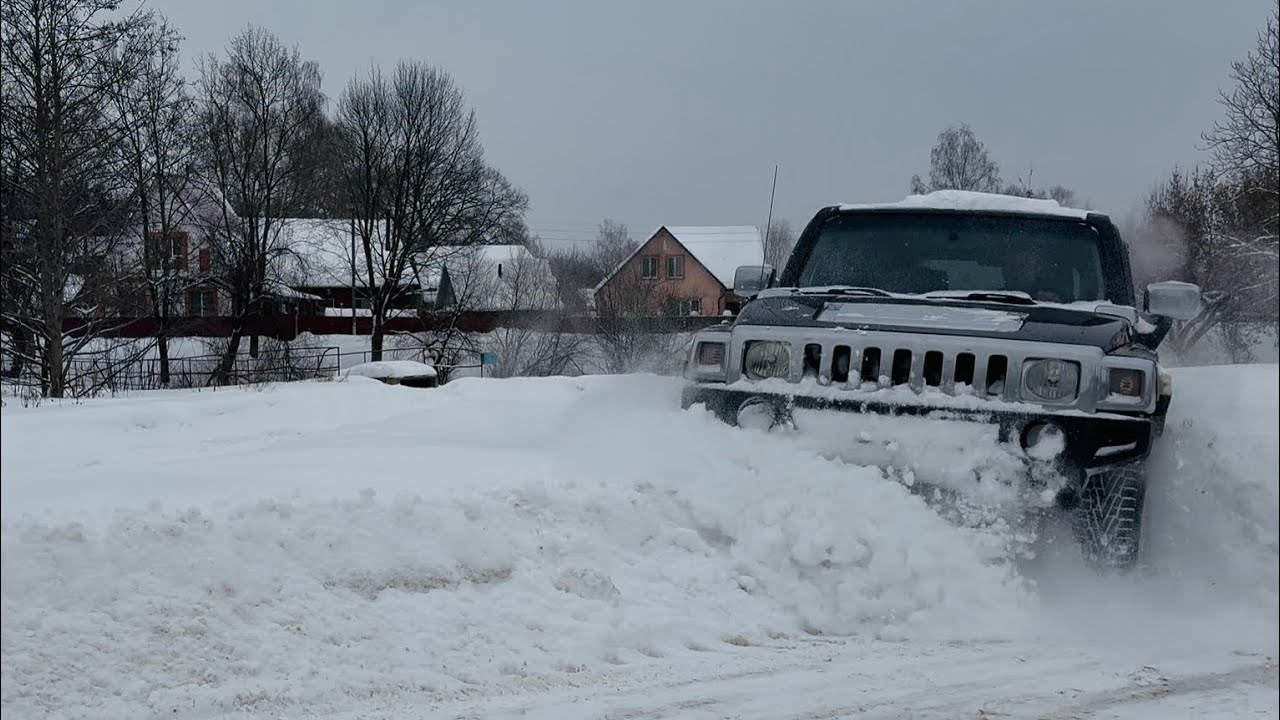 Hummer is driving to lake of the forest  