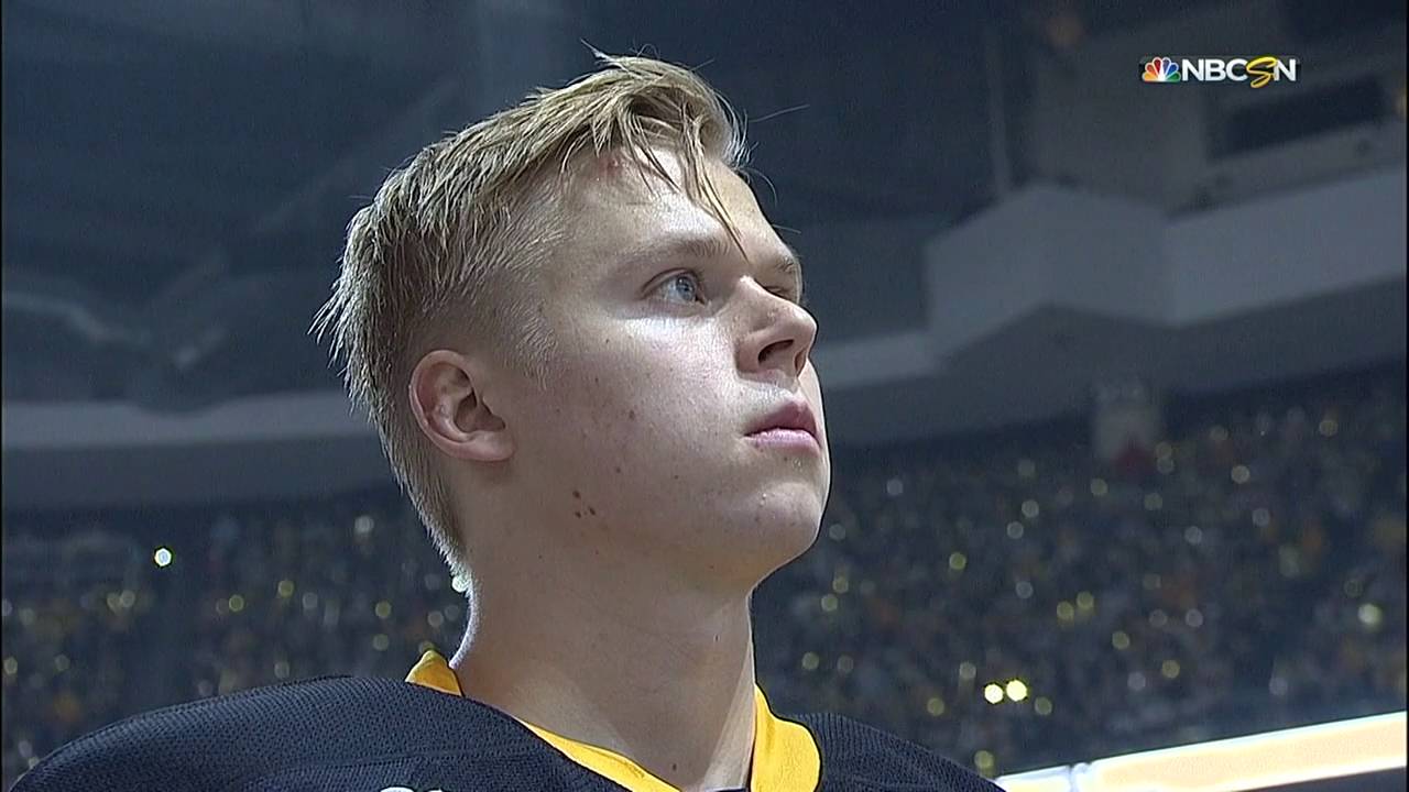 Crosby skates out with Stanley Cup as Penguins raise banner