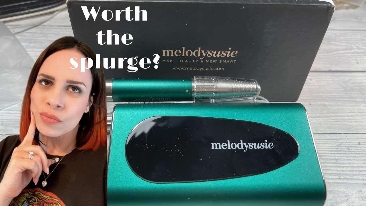 Finally removing my 4 1/2 week old nails. Using the new Melodysusie sparkle plus