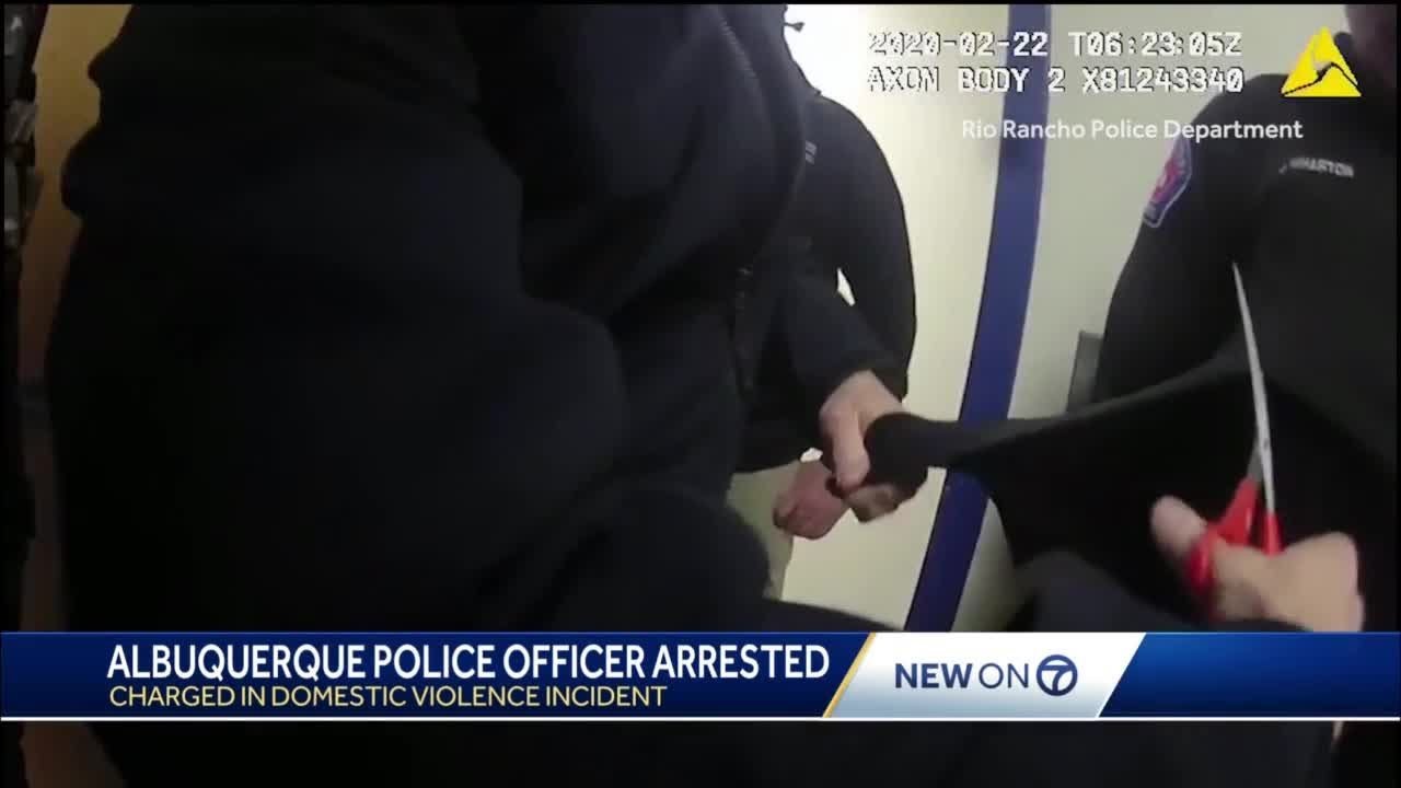 APD officer's uniform cut off during  arrest