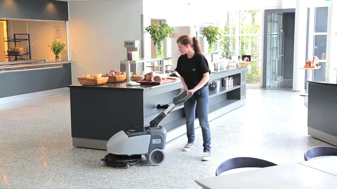Nilfisk Scrubber SC351 scrubbing and drying.