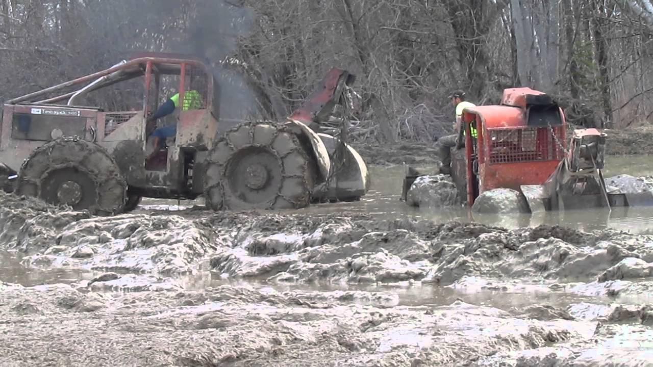 Skidder Pulls Another Skidder And A Chevy 4x4 Out Of DEEP MUD