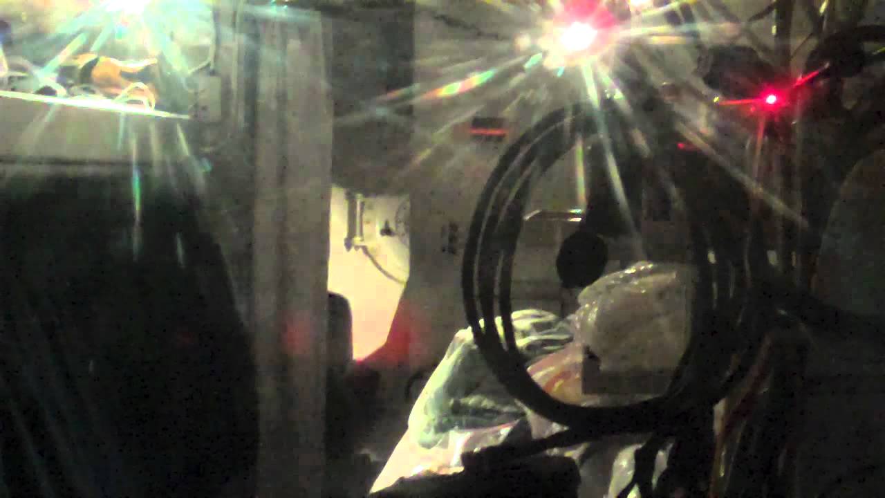Saturation divers getting some food through a med-lock.