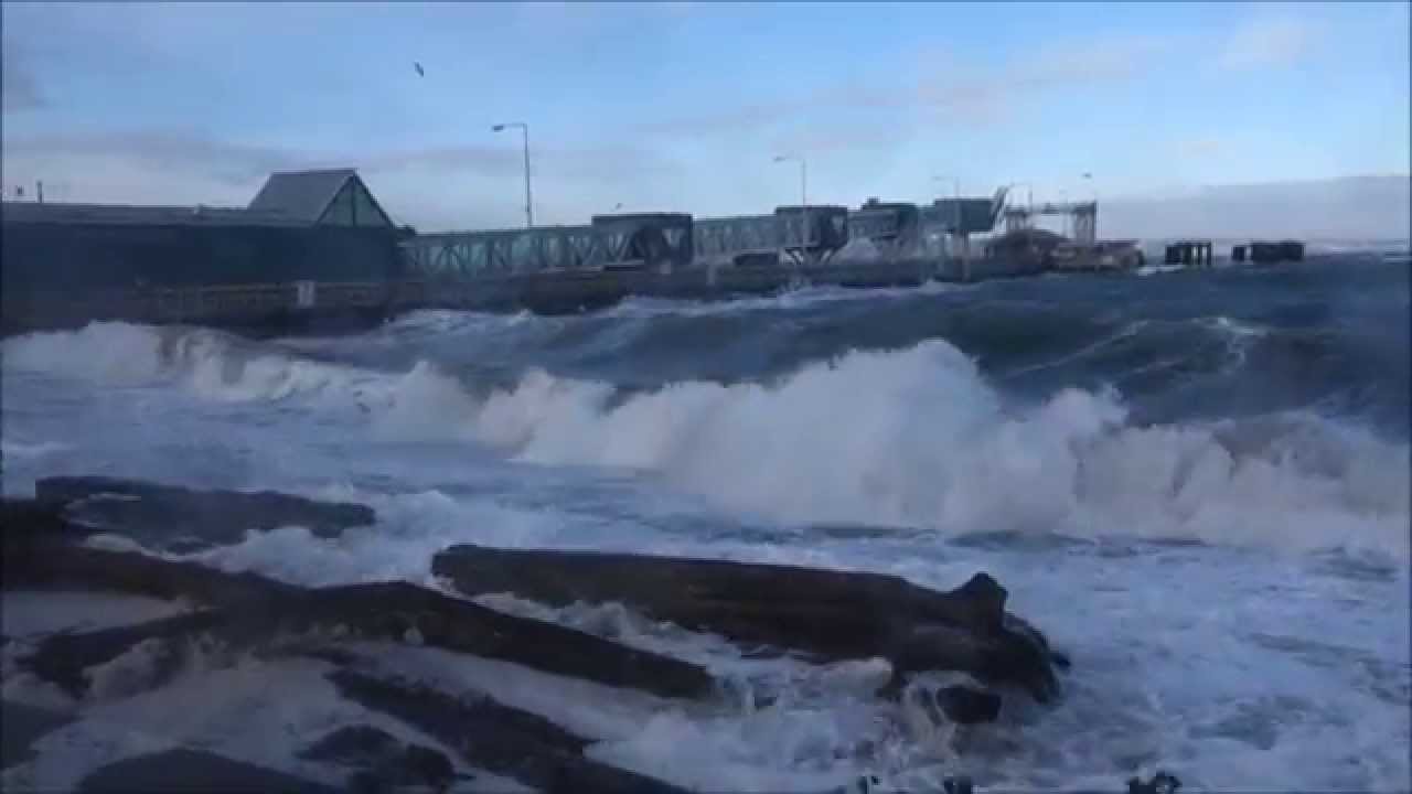 Winter Storm at Edmonds ferry dock Brackett's Landing - large waves crashing on beach