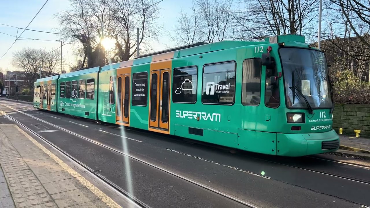 Sheffield Supertram 112 departs Infirmary Road with a Yellow Route Service for Middlewood