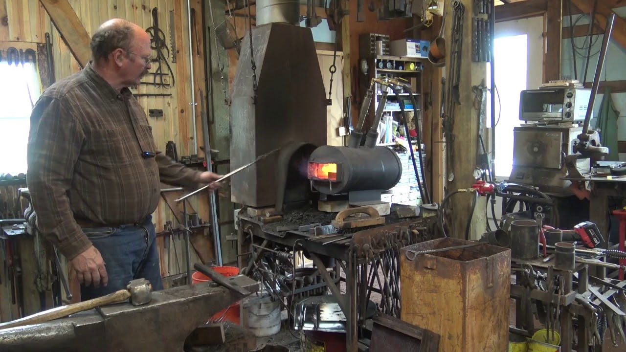 Hydraulic forging press, Punching an eye under the 24 ton press.