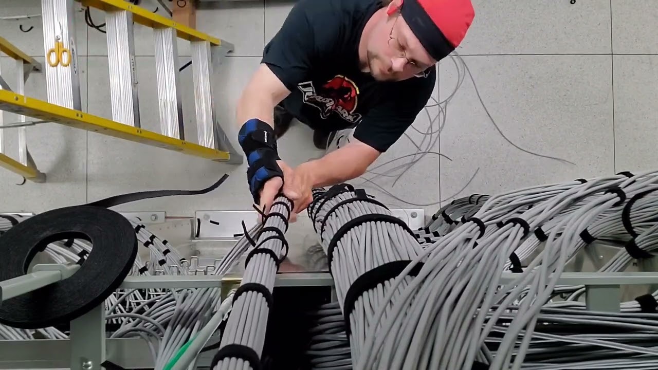Hand-combing new Cat5e cable for patch panels