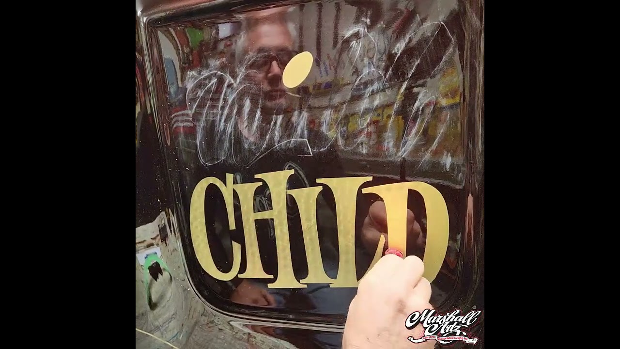 hand lettering an altered dragster.