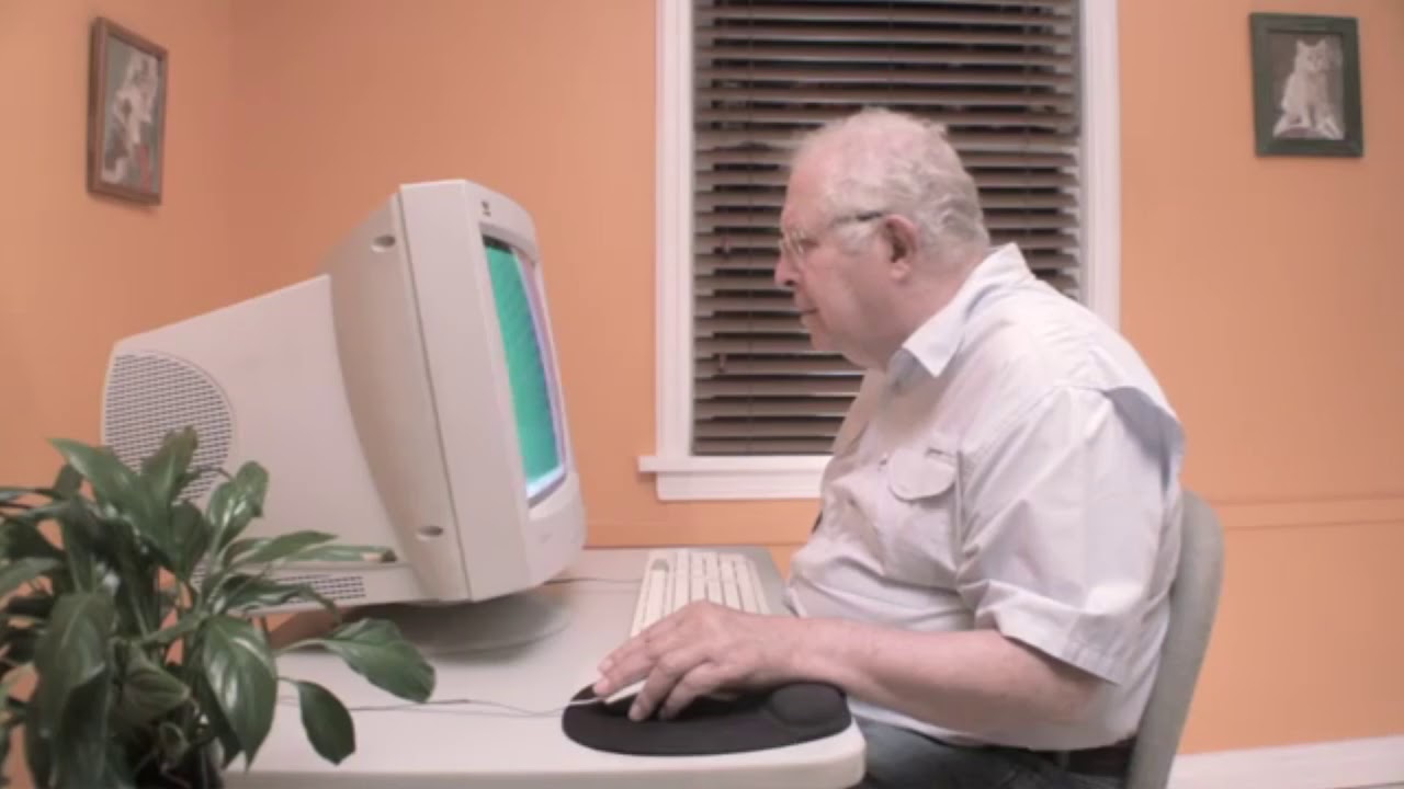 Old Man Cleans His Computer