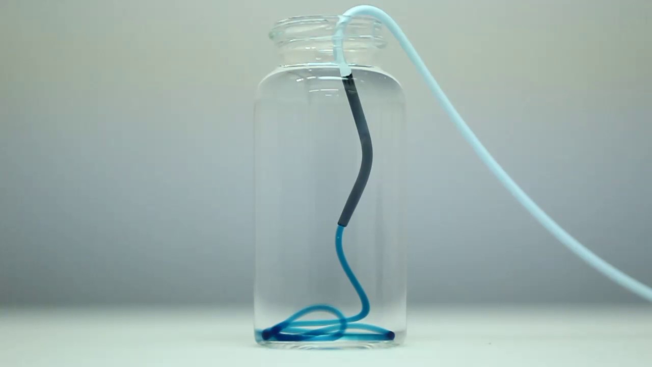 An embolizing hydrogel that shifts its phase in response to mechanical shear forces