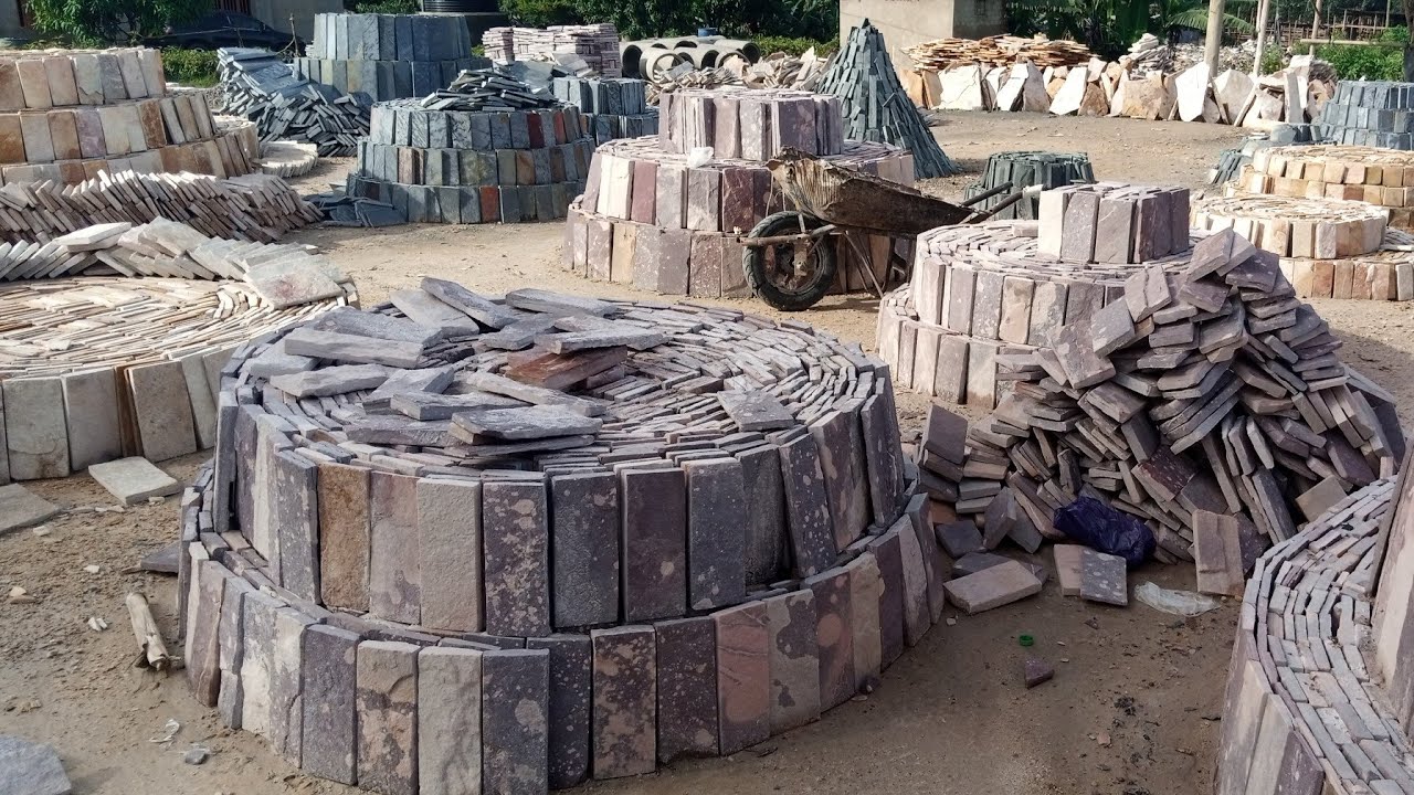 Amayinja gadizayini gebasiba kubisenge ne kubikomera gamekaa #slate stone wall clabbing #engineering