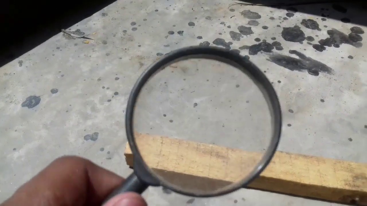 MAGNIFINE GLASS EXPRIMENT