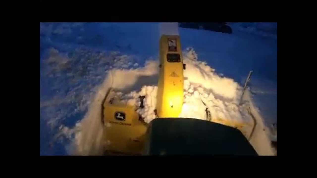 John Deere 455 With 47 Inch Blower Blowing Out a Stuck Plow Truck.