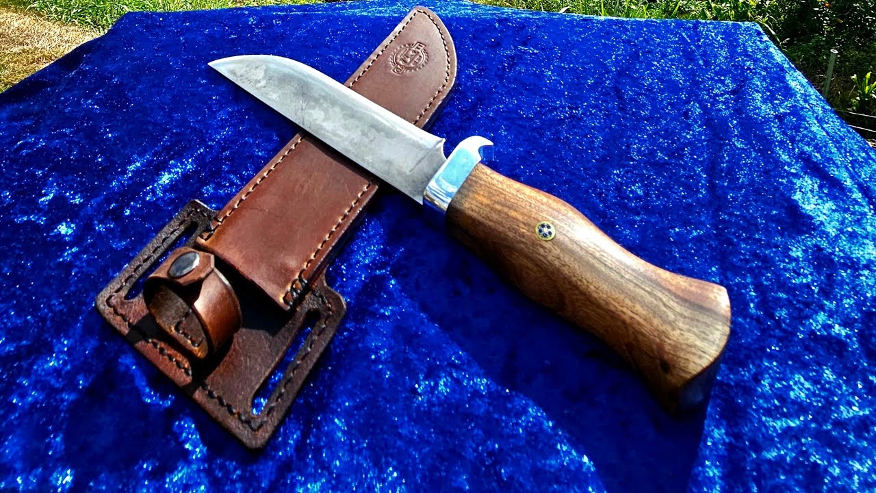 Carbon steel Bushcraft knife and leather sheath 