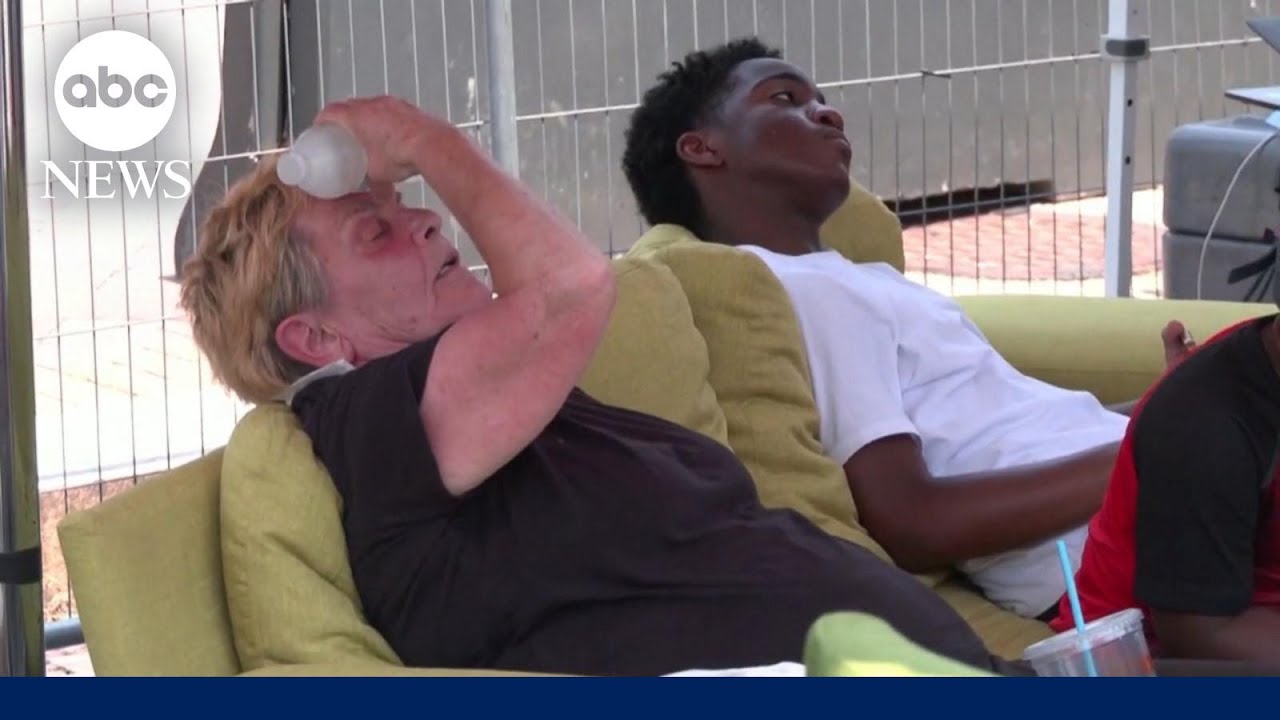 Dangerous heat blankets much of the US as floods force evacuations in Midwest