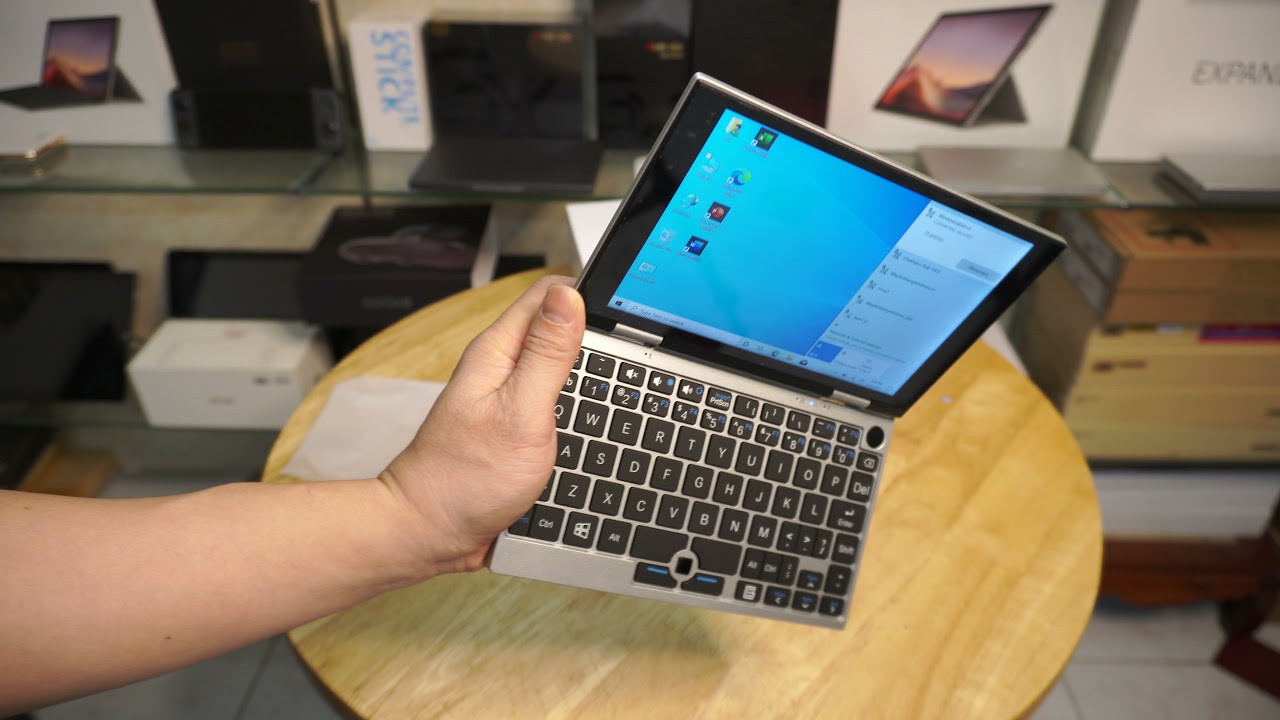 Tren tay mini laptop OEM Yoga book chip N4200/8G/128G eMMC/7 inch Full HD