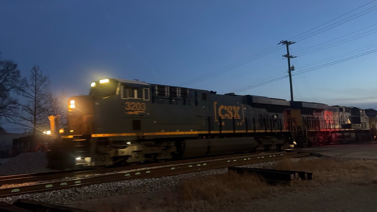 CSXT empty double barrel coal ES44 ES44 CM44 ES44 ES44 w/ 200+ and funky K5HL at Wilson NC 