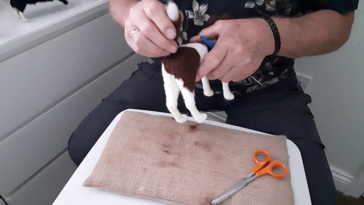 Needle felted dog sculptures