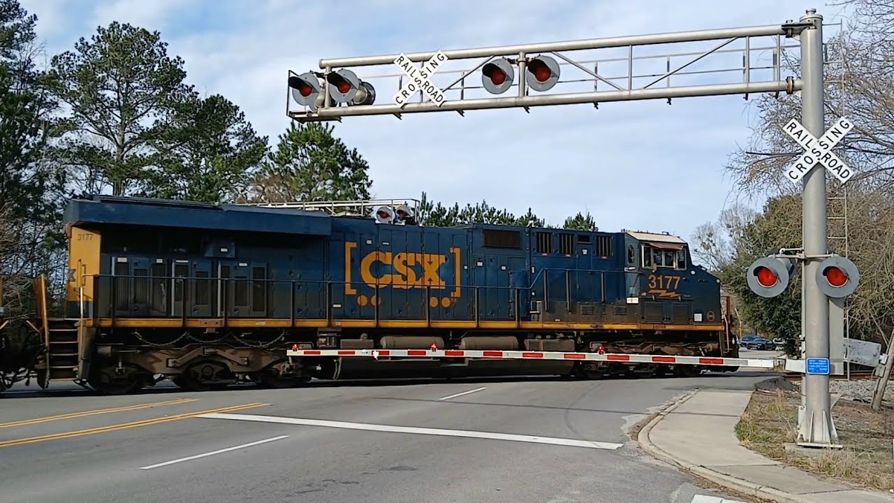 CSXT 3177 Leads CSX Train E321 Across Saint Andrews Road On The CN&L Subdivision 
