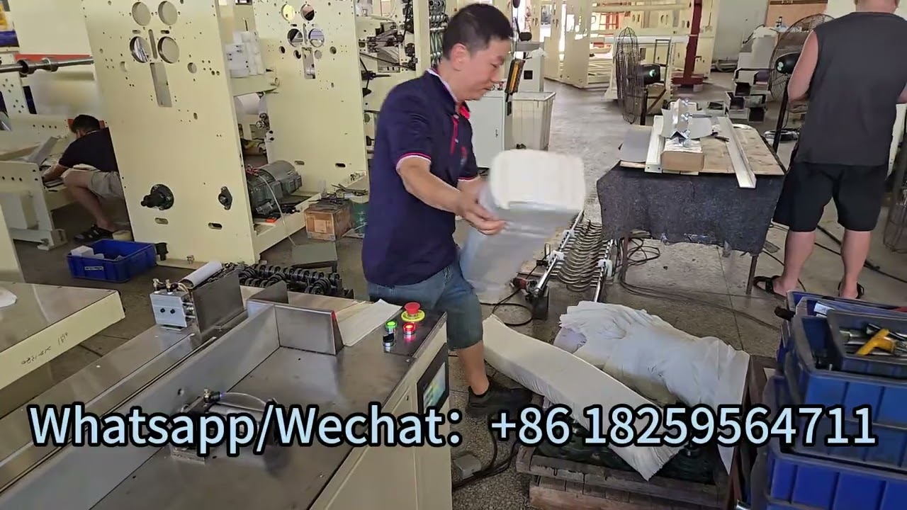 Semi-automatic N-fold hand towel wrapping machine and cutting machine