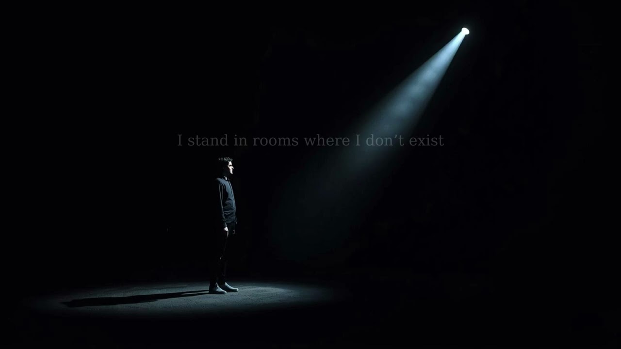 I stand in rooms where I don’t exist