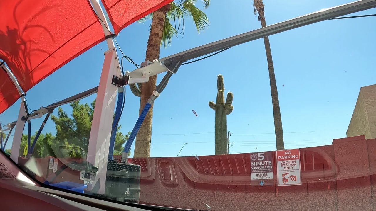 Vacuuming at Genie Car Wash, 2831 E McKellips Rd, Mesa, Arizona, 17 June 2024, NGH20006