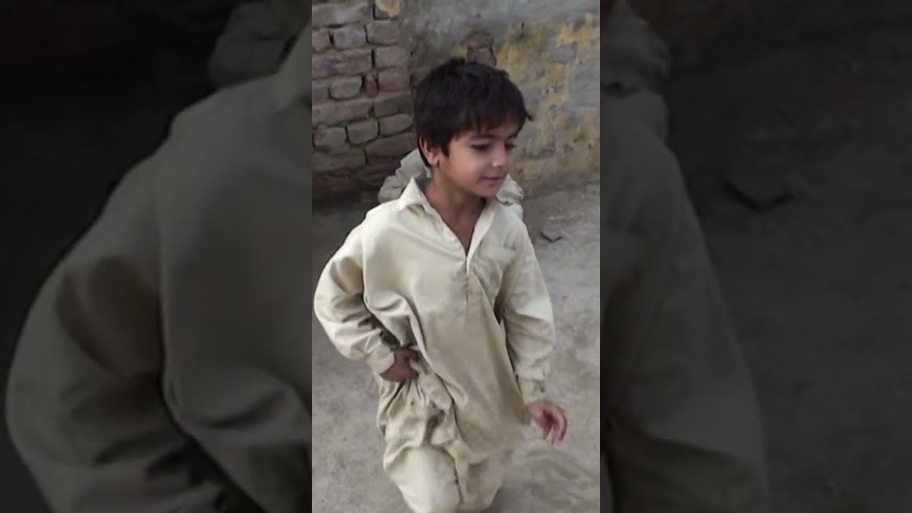 Kids Playing Marbles - Pakistan
