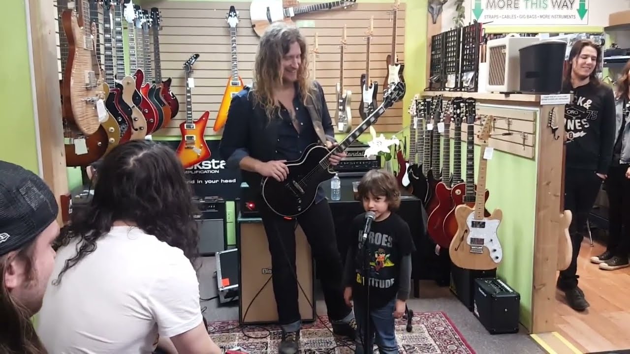 Jared James Nichols is introduced by a kid at a guitar shop in Vancouver