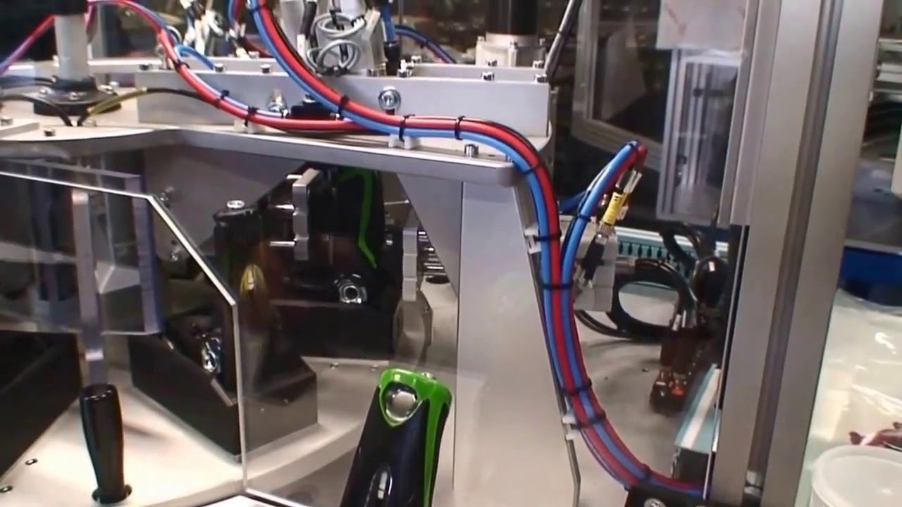Machine d'assemblage et de marquage