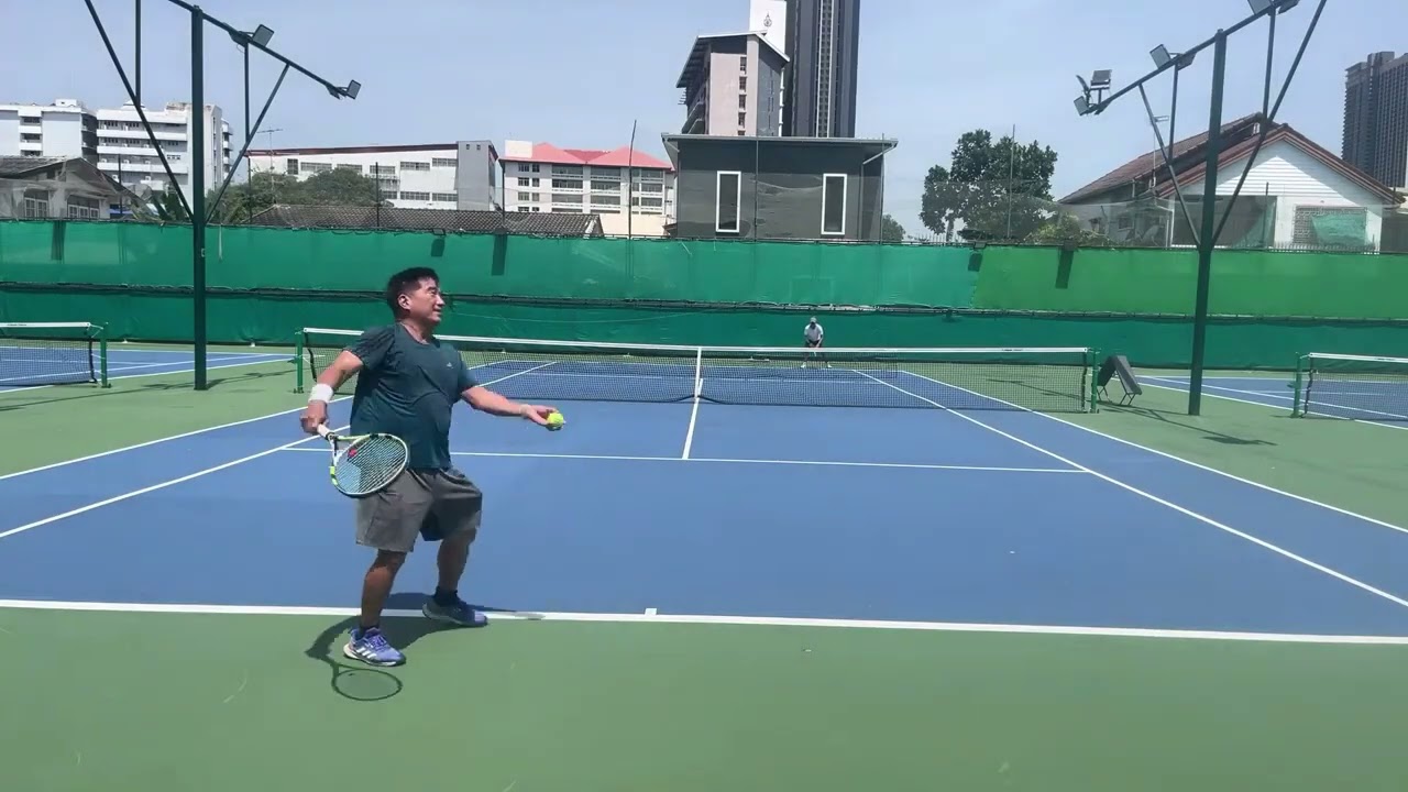 Hawaii Tennis Pro playing his unique-drop, serve volley, chip charge, and power game
